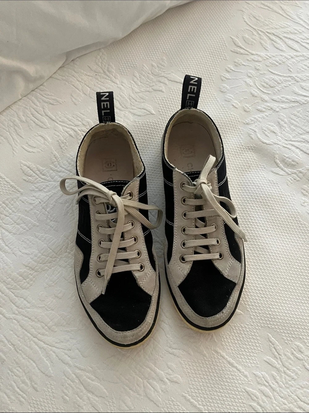 Chanel Women’s Black and Cream Lace-Up Sneakers